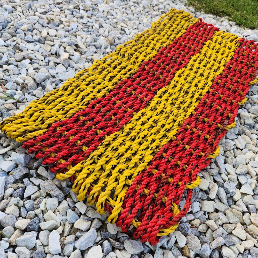 Vibrant Red and Yellow Woven Door Mat